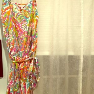 Lilly Pulitzer romper with tie at the waist.